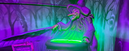 Glowing witch and cauldron scene at The 13th Hole
